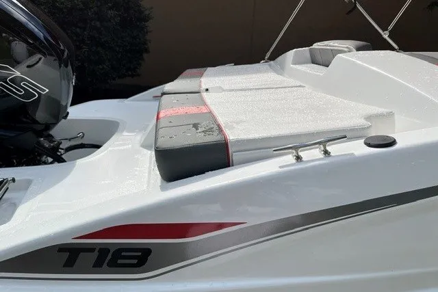 Slide: The Image of 2027 Tahoe T18 boat with sleek design and modern features, showcasing rear seating area. - 7