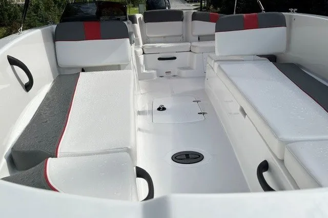 Slide: The Image of 2027 Tahoe T18 boat interior with white and gray seating, red accents, and spacious layout. - 4