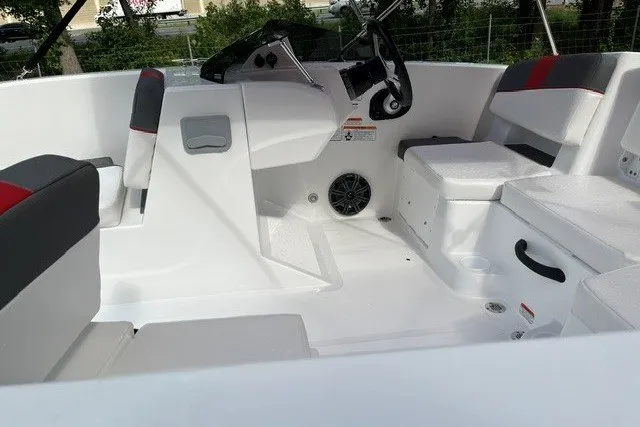 Slide: The Image of Interior of 2027 Tahoe T18 boat with modern seating and steering console. - 9