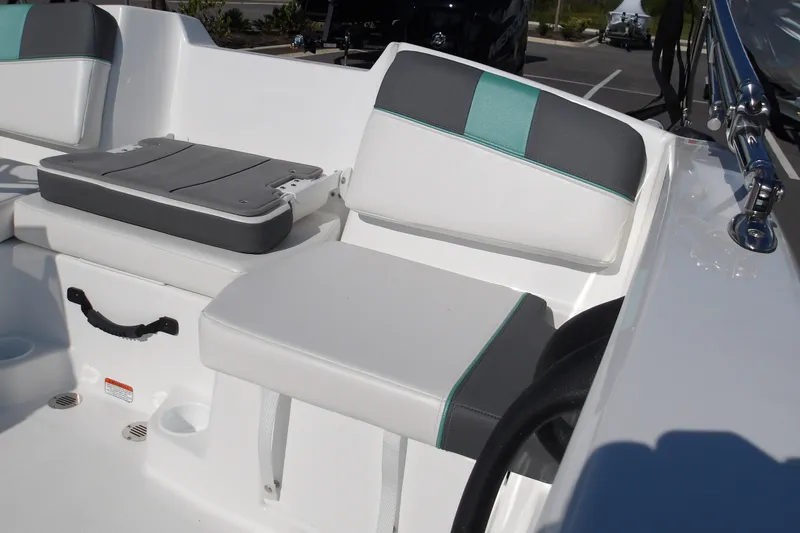 Slide: The Image of 2027 Tahoe T16 boat interior with cushioned seating and modern design. - 16