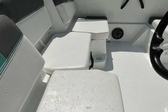 Slide: The Image of Interior of 2027 Tahoe T16 boat with wet white seating and cup holder. - 9
