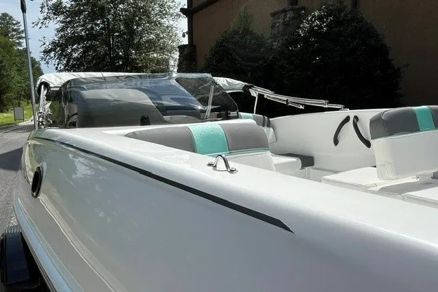 Slide: The Image of 2027 Tahoe T16 boat with sleek white design and modern seating. - 11