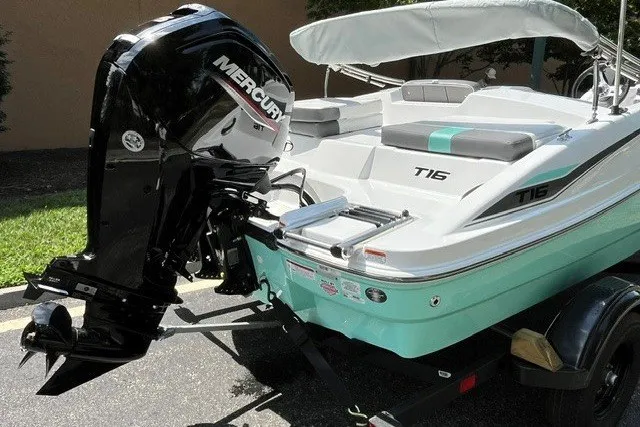 Slide: The Image of 2027 Tahoe T16 boat with Mercury outboard engine on a trailer. - 7