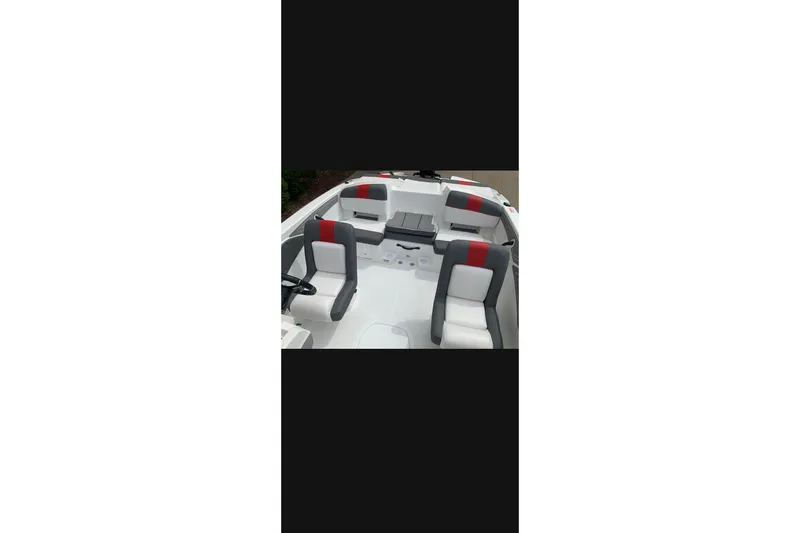 Slide: The Image of 2027 Tahoe T21 boat interior with modern seating and sleek design. - 6
