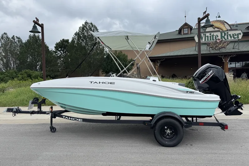 The Image of 2027 Tahoe T16 boat on trailer, parked near White River Fly Shop. - 0