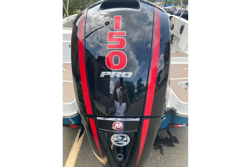 Slide: The Image of Outboard motor with "150 PRO" branding on a Tahoe 1950 model boat, year 2027. - 5