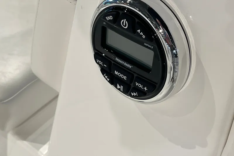 Slide: The Image of Control panel of 2027 Tahoe T16 boat featuring audio system interface. - 32