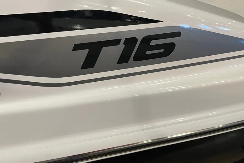 Slide: The Image of 2027 Tahoe T16 boat model logo on sleek white surface. - 3