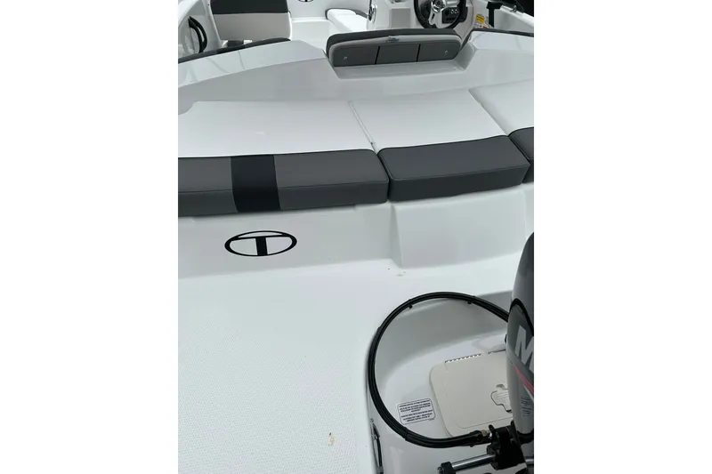 Slide: The Image of 2027 Tahoe T16 boat interior with sleek seating and modern design. - 5
