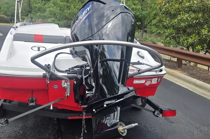 Slide: The Image of Red and white 2027 Tahoe T16 boat with Mercury outboard motor. - 4