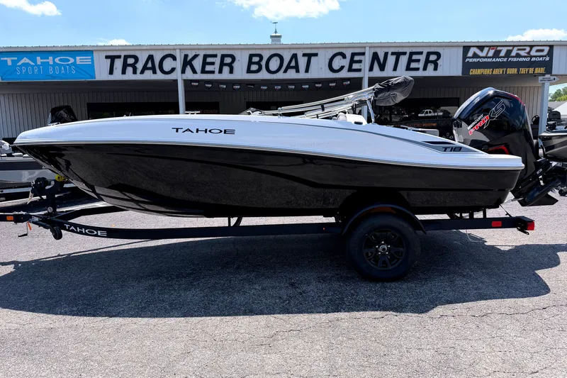The Image of 2027 Tahoe T18 boat on trailer at Tracker Boat Center dealership. - 0
