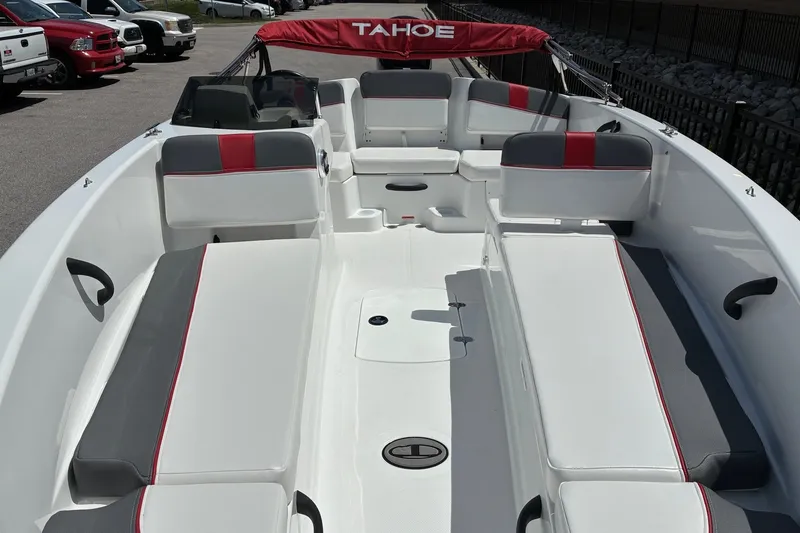 Slide: The Image of 2027 Tahoe T18 boat interior with red and gray seating, open deck layout. - 6