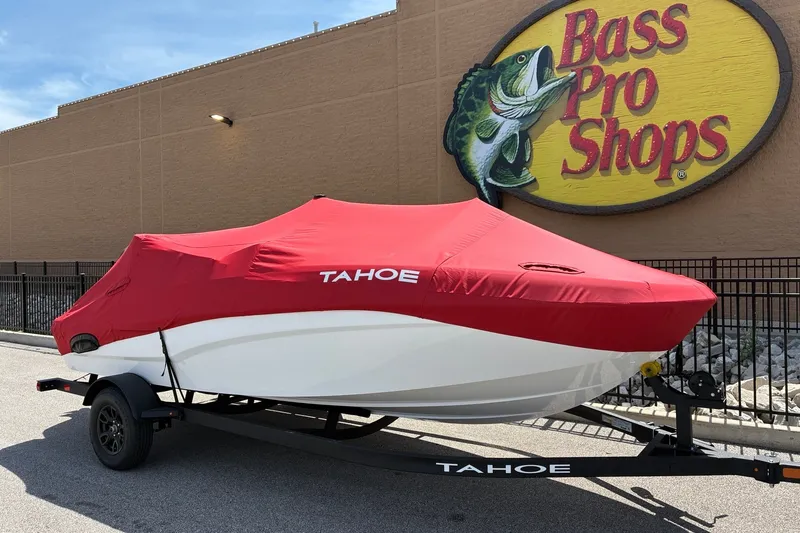 Slide: The Image of 2027 Tahoe T18 boat with red cover at Bass Pro Shops. - 12