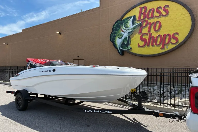 Slide: The Image of 2027 Tahoe T18 boat on trailer outside Bass Pro Shops store. - 4