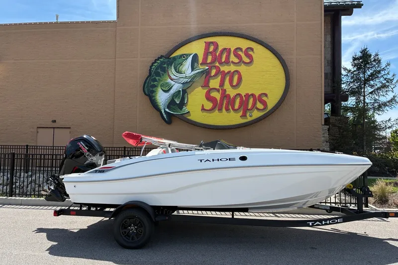 The Image of 2027 Tahoe T18 boat on trailer outside Bass Pro Shops store. - 0