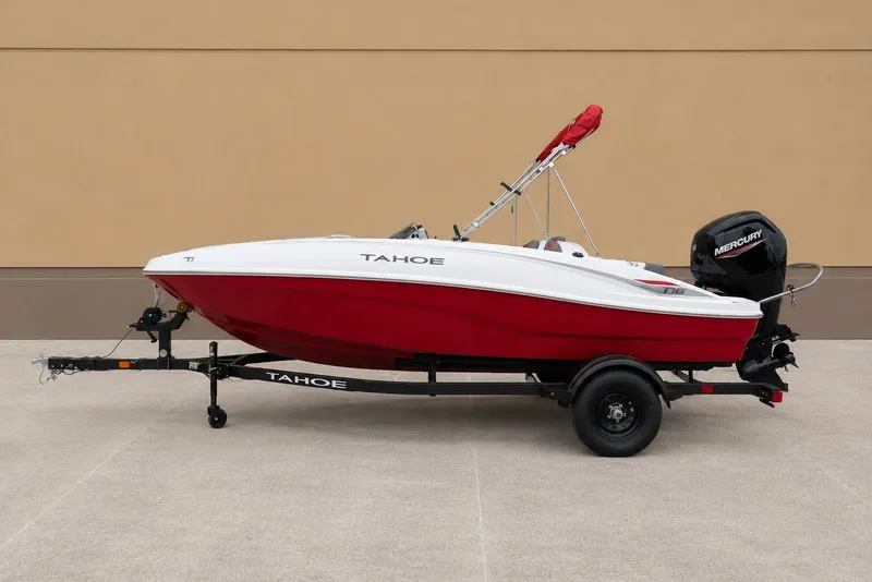 The Image of 2027 Tahoe T16 boat with red hull on trailer, featuring Mercury outboard motor. - 0