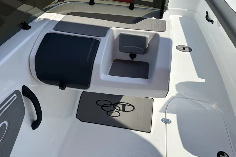 Slide: The Image of Interior view of a 2027 Tahoe T21 boat, featuring seating and storage compartments. - 21