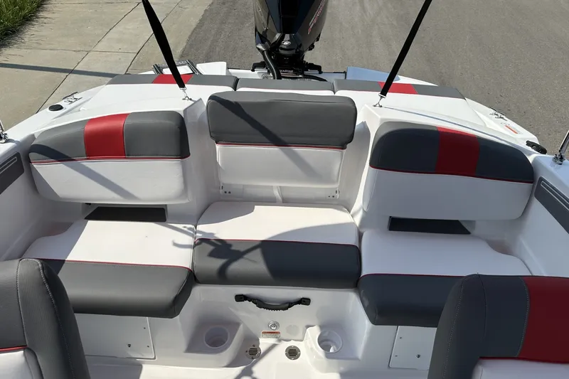 Slide: The Image of 2027 Tahoe T21 boat interior with gray and red seating, showcasing modern design. - 23