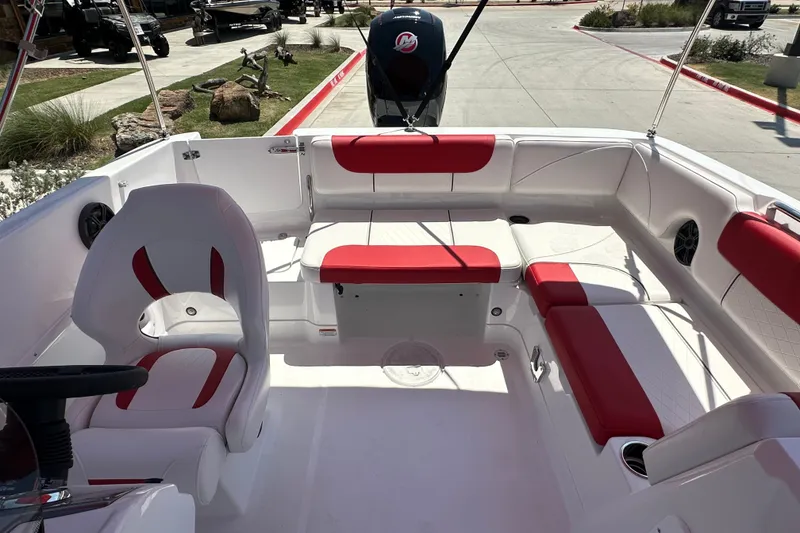Slide: The Image of Interior of a 2027 Tahoe 1950 boat with red and white seating. - 18