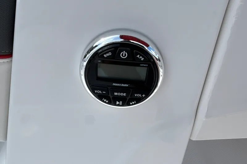 Slide: The Image of Control panel on 2027 Tahoe T18 boat dashboard with volume and mode buttons. - 16