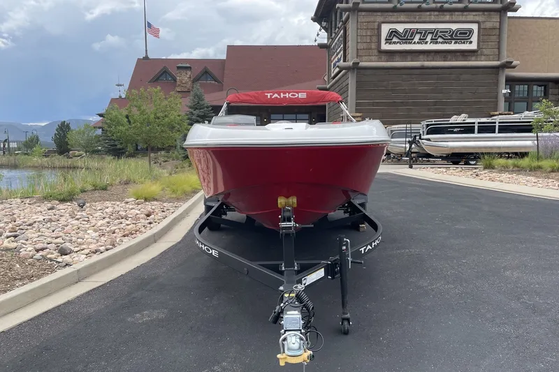 Slide: The Image of 2027 Tahoe T18 boat on trailer, parked outside Nitro Performance Fishing Boats building. - 6