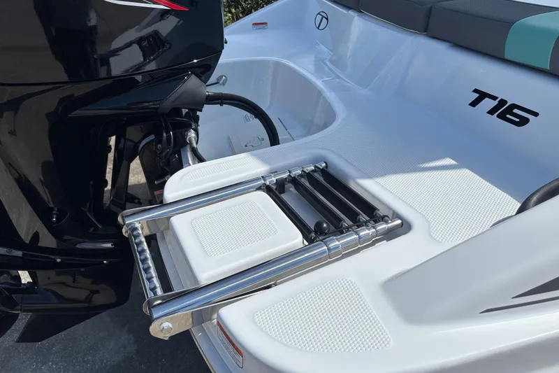 Slide: The Image of 2027 Tahoe T16 boat with a foldable ladder and sleek design. - 22