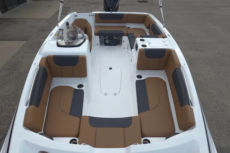 Slide: The Image of 2027 Tahoe 1950 boat interior with spacious seating and modern design. - 13