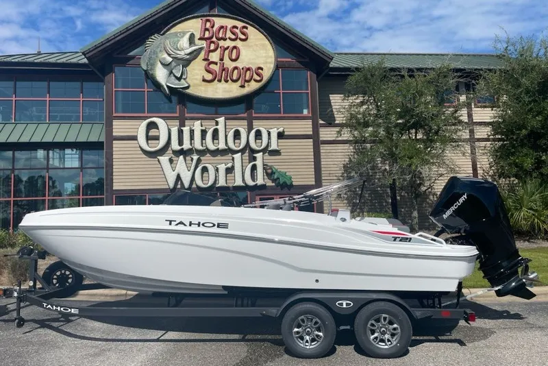 Slide: The Image of 2027 Tahoe T21 boat on trailer outside Bass Pro Shops Outdoor World. - 6