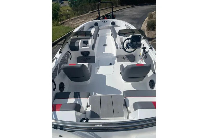 Slide: The Image of 2027 Tahoe T21 boat interior with modern seating and steering console. - 3