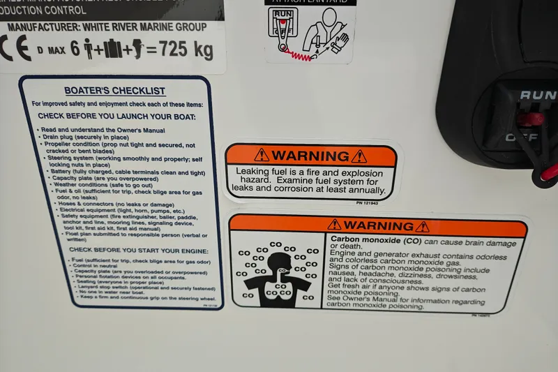 Slide: The Image of Boater's safety checklist and warning labels on a 2027 Tahoe T16 boat dashboard. - 19
