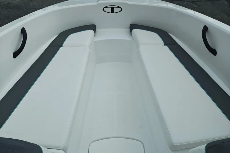 Slide: The Image of 2027 Tahoe T16 boat interior with sleek white and gray seating, featuring modern design elements. - 25