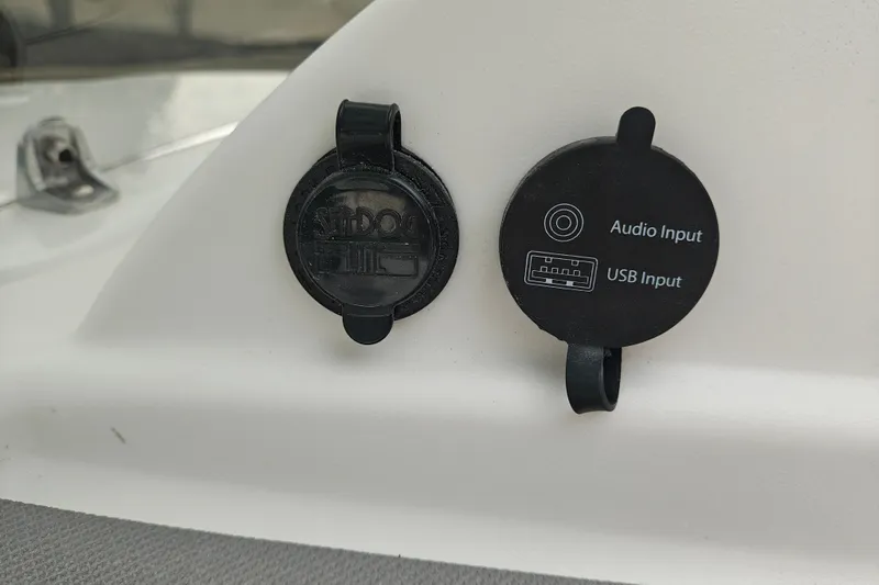Slide: The Image of Audio and USB input ports on a 2027 Tahoe T16 boat. - 13