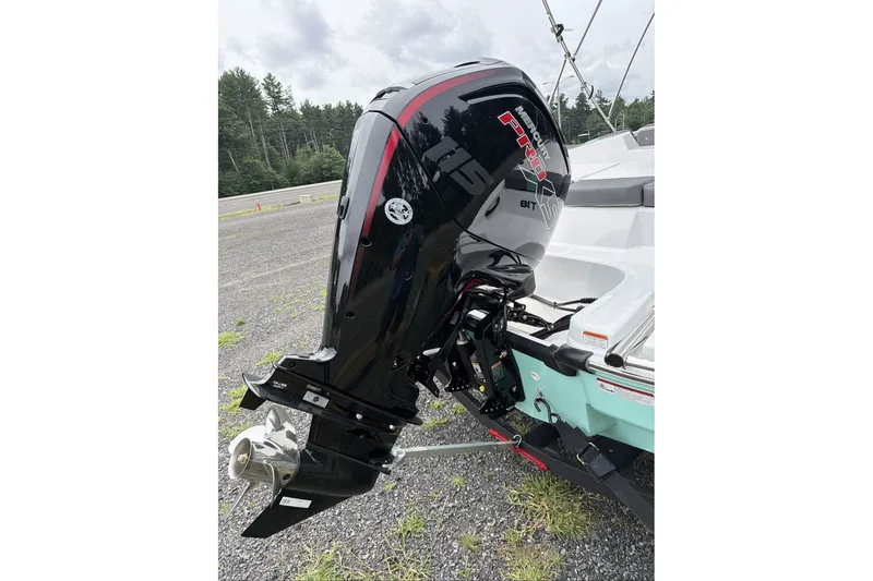 Slide: The Image of 2027 Tahoe T18 boat with Mercury Pro XS outboard motor in a scenic outdoor setting. - 10