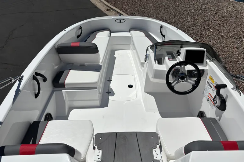 Slide: The Image of 2027 Tahoe T16 boat interior with modern dashboard and seating arrangement. - 6