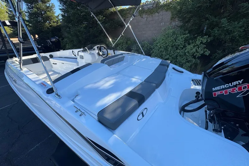 Slide: The Image of 2027 Tahoe T18 boat with Mercury Pro engine, featuring sleek white design and spacious seating. - 10