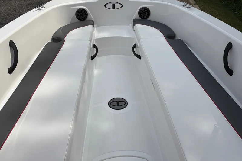 Slide: The Image of Interior of 2027 Tahoe T18 boat with white and gray seating. - 7