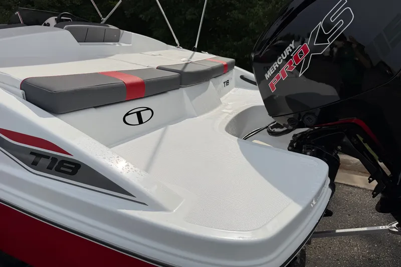 Slide: The Image of 2027 Tahoe T18 boat with Mercury Pro XS engine, featuring sleek design and comfortable seating. - 11