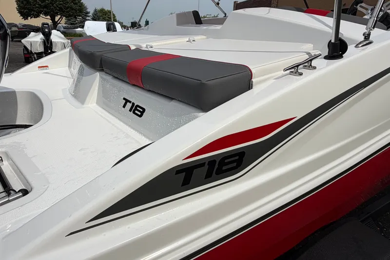 Slide: The Image of 2027 Tahoe T18 boat with sleek design and comfortable seating. - 12