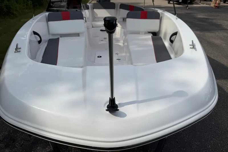 Slide: The Image of 2027 Tahoe T18 boat with sleek white design and spacious seating. - 5