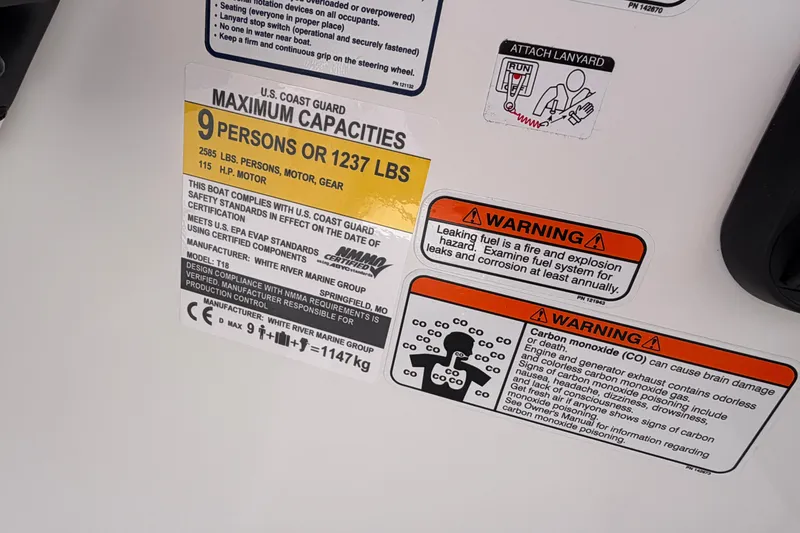Slide: The Image of Safety labels on a 2027 Tahoe T18 boat, detailing capacity and warnings. - 25