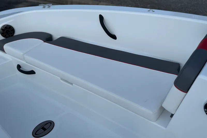 Slide: The Image of 2027 Tahoe T18 boat interior with cushioned seating and sleek design. - 17