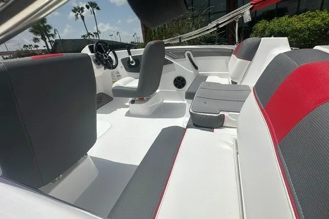 Slide: The Image of Interior of 2027 Tahoe T21 boat with modern seating and steering wheel. - 10