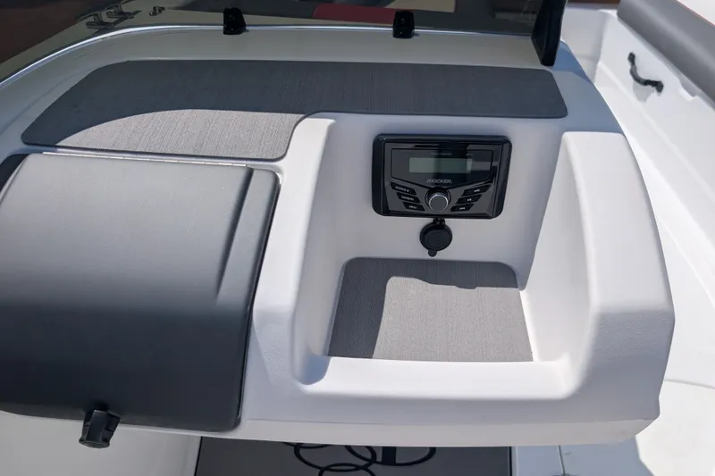 Slide: The Image of Dashboard of 2027 Tahoe T21 boat featuring a modern audio system. - 16