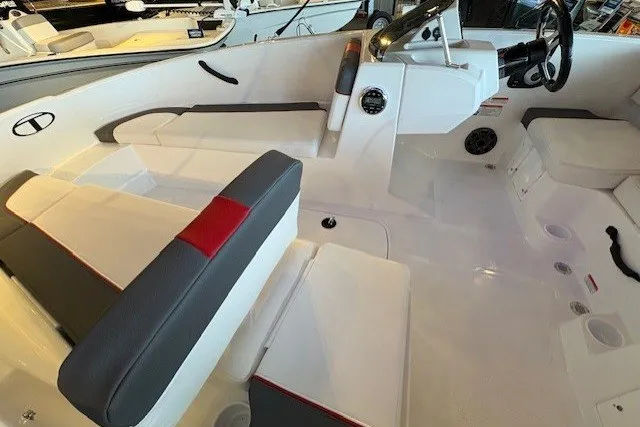 Slide: The Image of Interior of 2027 Tahoe T16 boat with modern seating and steering console. - 3