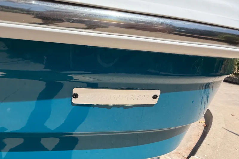 Slide: The Image of Blue Tahoe 1950 boat with visible identification plate, model year 2027. - 20