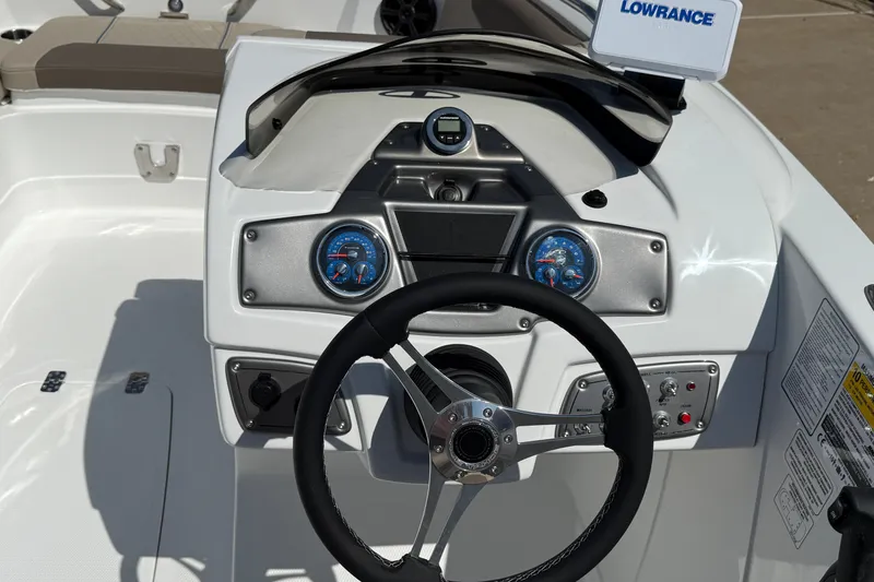 Slide: The Image of Steering console of 2027 Tahoe 1950 boat with modern gauges and controls. - 8