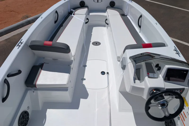 Slide: The Image of 2027 Tahoe T18 boat interior with sleek seating and modern dashboard design. - 10