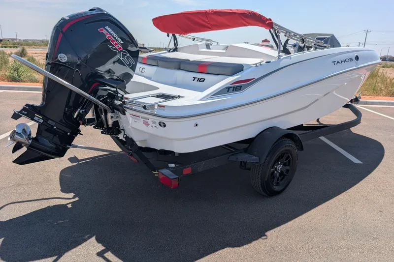 Slide: The Image of 2027 Tahoe T18 boat with Mercury engine on trailer in parking lot. - 5