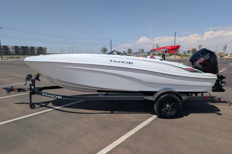 The Image of 2027 Tahoe T18 boat on trailer in parking lot, side view. - 0