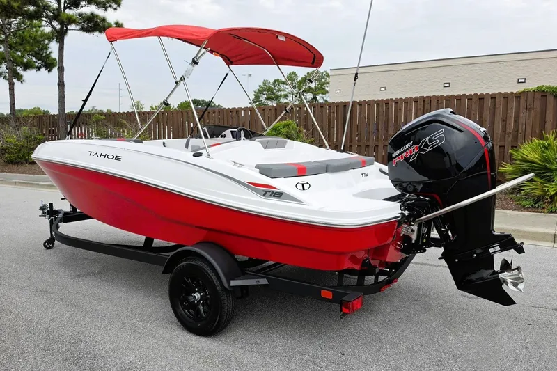 Slide: The Image of 2027 Tahoe T18 boat with red hull and Mercury Pro XS engine. - 10